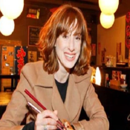 Miranda Manasiadis was holding a chopstick and posing for a photo shoot